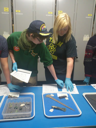 Students participating in bronze age metalwork